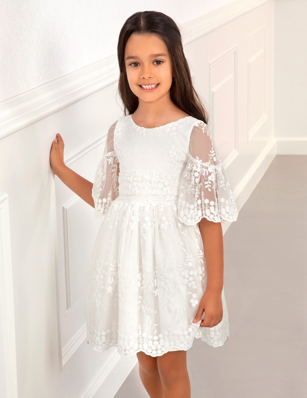 white dress with embroidered flowers