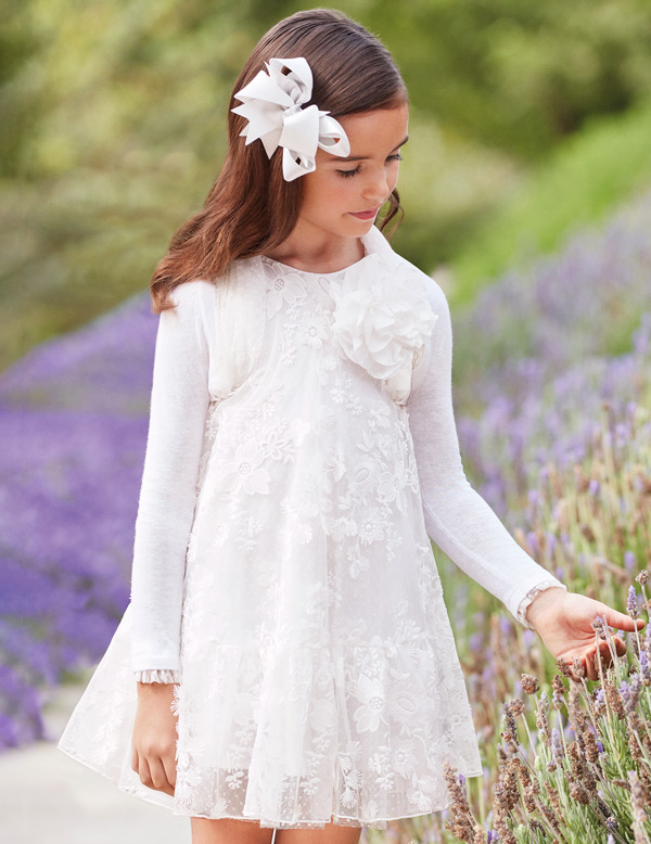white dress with embroidered flowers